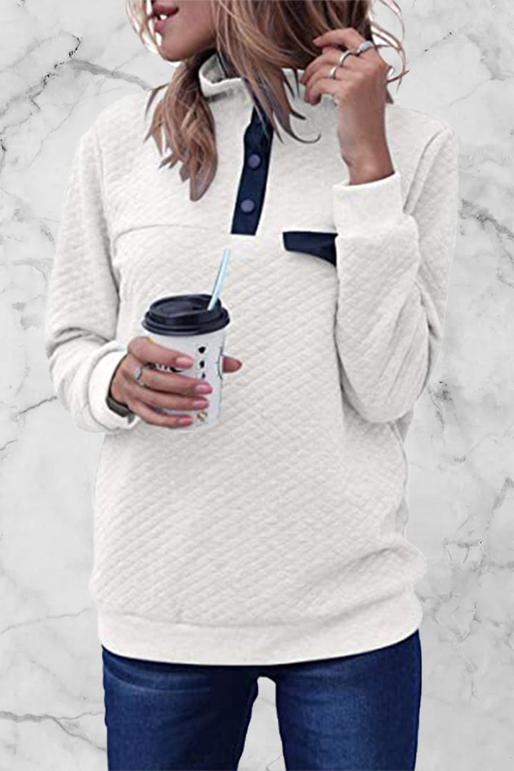 Stilla | Pullover med ensfarvet patchwork og rullekrave