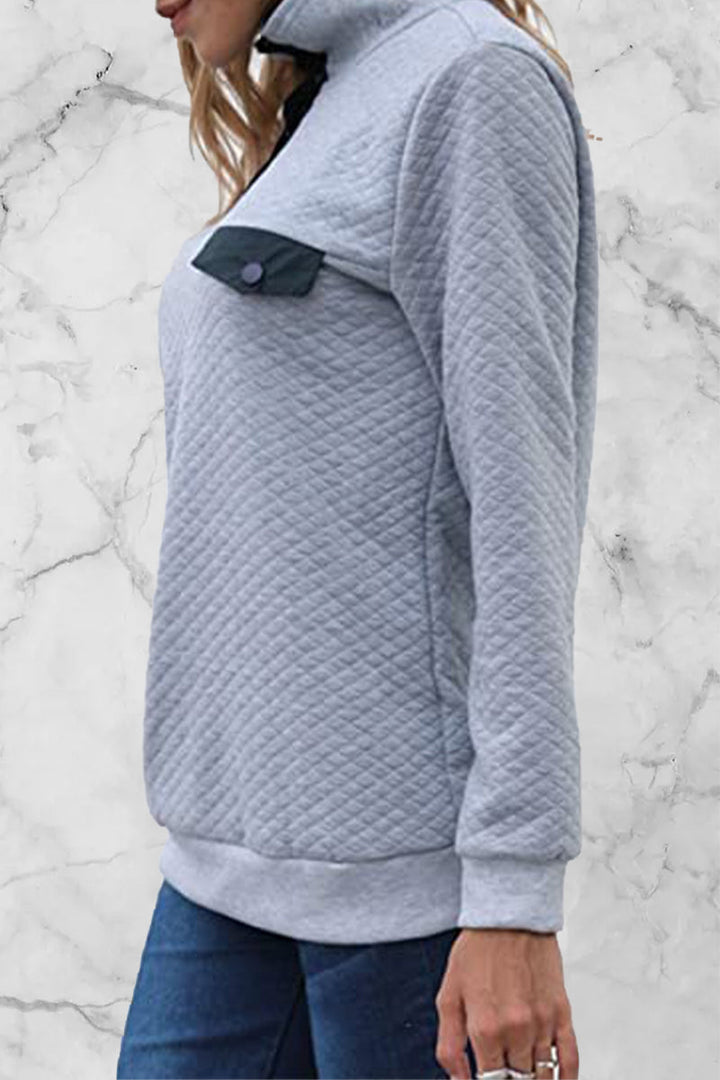 Stilla | Pullover med ensfarvet patchwork og rullekrave
