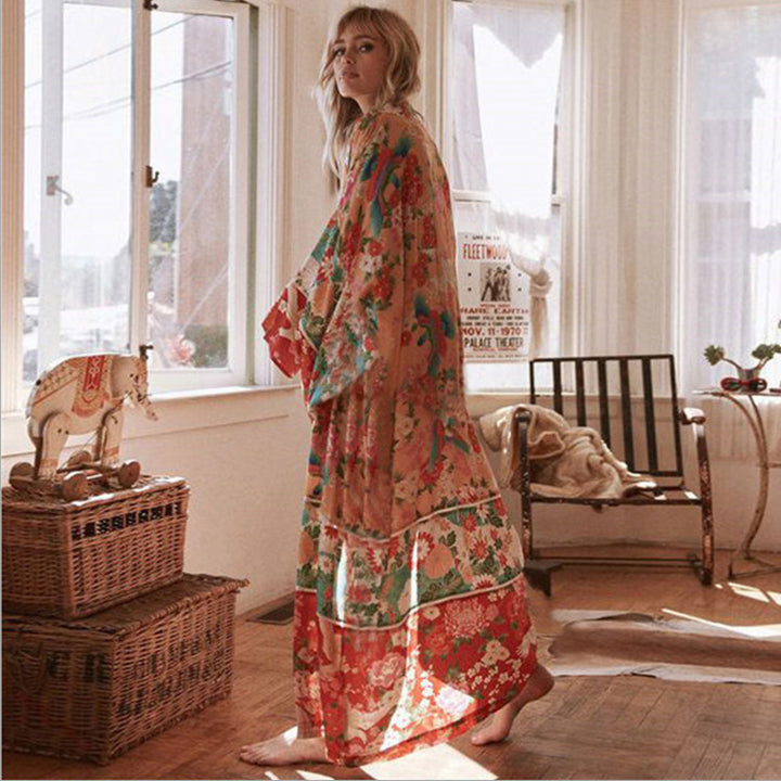 Dame luftig kaftan med farverigt blomsterdesign og brede ærmer Stilla
