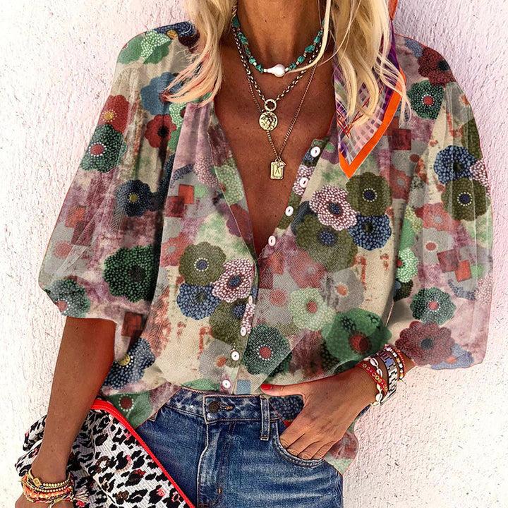Dame toppe i boho-stil med blomsterprint og løs pasform Stilla