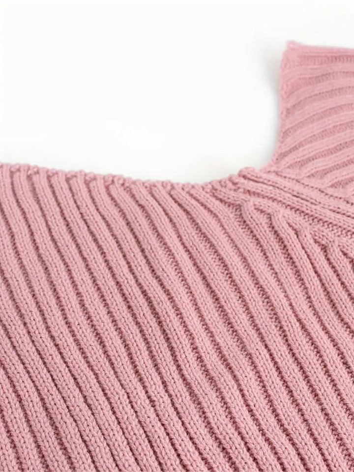 Stilla | Pullover i ribstrik med asymmetrisk udskæring