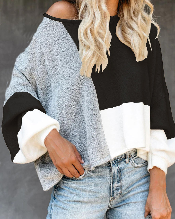Damerne mode oversized sweater med unik snit og kontrasterende farveblokke Stilla
