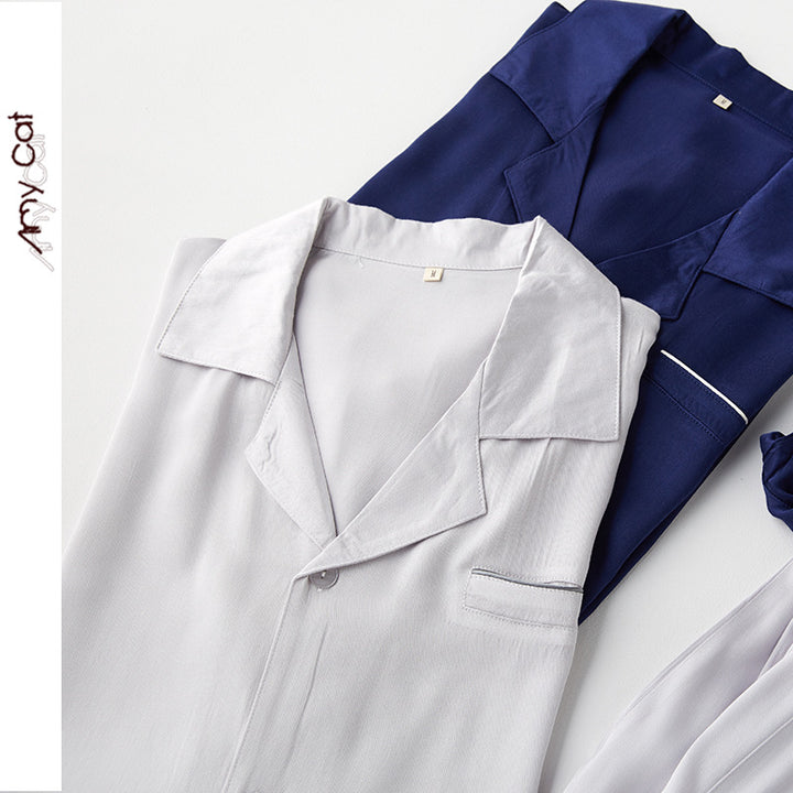 Dame Satin Pyjamas Sæt med elegant knaplukning og afslappet snit Stilla
