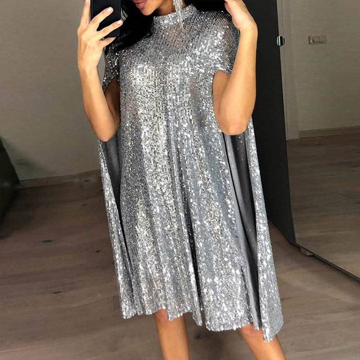 Dame aftenkjole med glitrende cape-snit og glamourøse pailletter stil