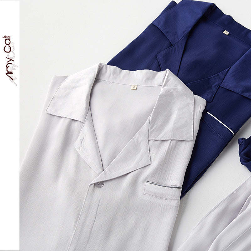 Dame Satin Pyjamas Sæt med elegant knaplukning og afslappet snit Stilla