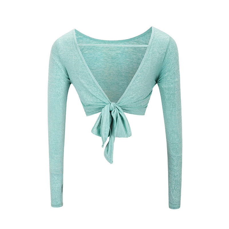 Dame sporttop med elegant rygudskæring og bindbart design Stilla