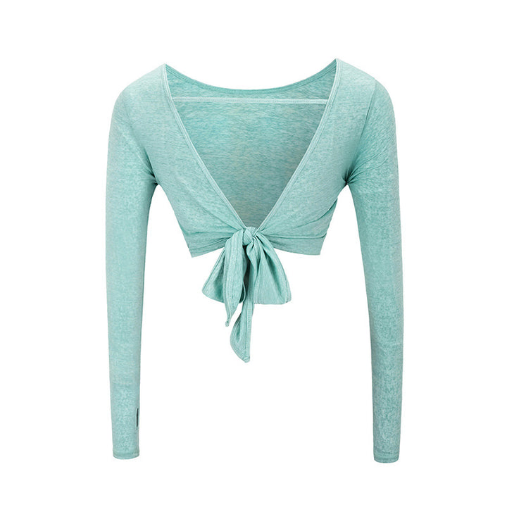 Dame sporttop med elegant rygudskæring og bindbart design Stilla