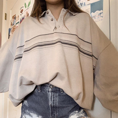 Dame Oversized Poloshirt med dekorative striber og knapdetaljer Stilla