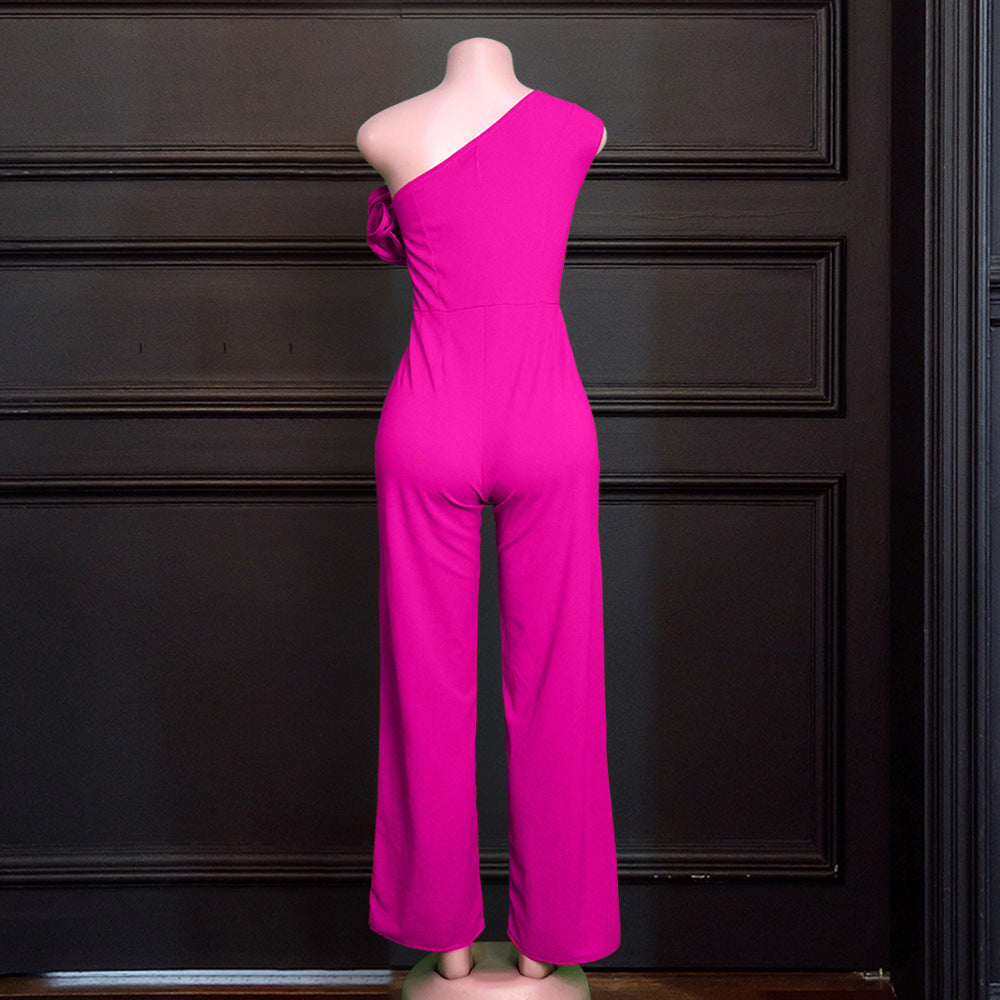Dame elegant jumpsuit med asymmetrisk snit og voluminøse flæse detaljer Skovae