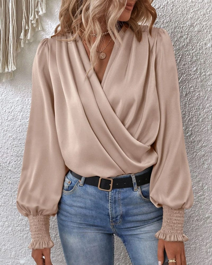 Stilla | Elegant indpakningsbluse med lange ærmer