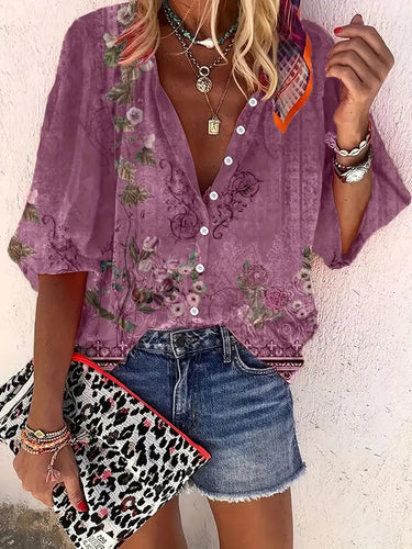 Stilla | Bluse med blomstermotiv og knaplukning