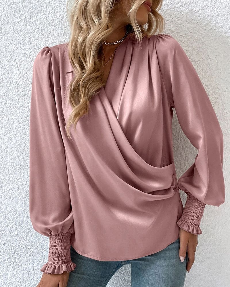 Stilla | Elegant indpakningsbluse med lange ærmer