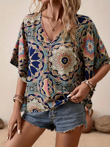 Stilla | Bluse med blomsterprint og V-udskæring