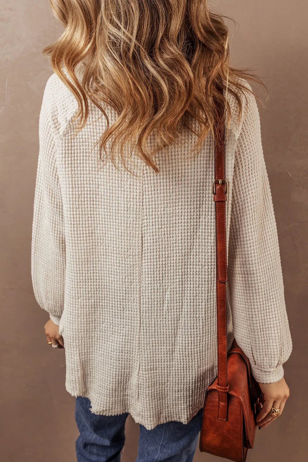 Stilla | Pullover med kort krave lavet af struktureret strik med halve knapper