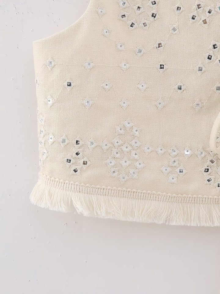 Stilla | Kort fritidsvest til kvinder om foråret med broderi og sløjfe