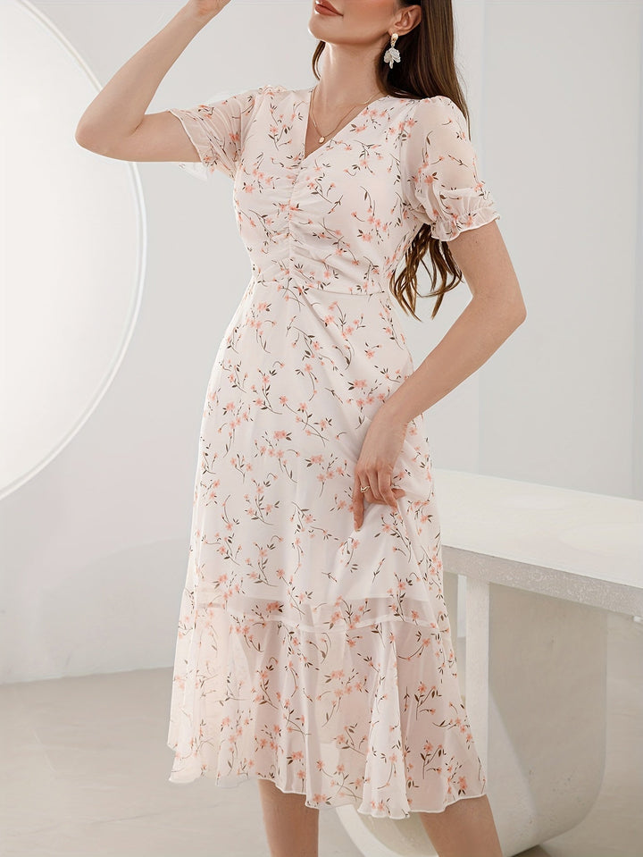 Stilla | Elegant Peplum Kjole Med Blomsterprint
