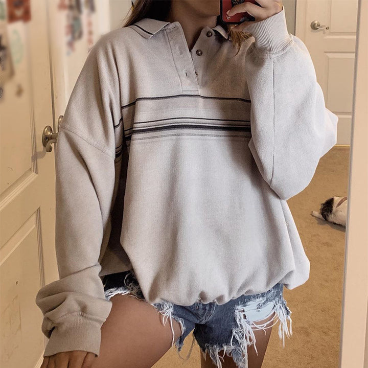 Dame Oversized Poloshirt med dekorative striber og knapdetaljer Stilla