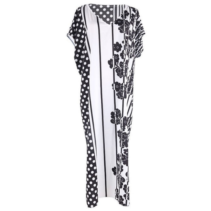 Dame Strandkjole i moderne patchwork-design med floral accent Stilla