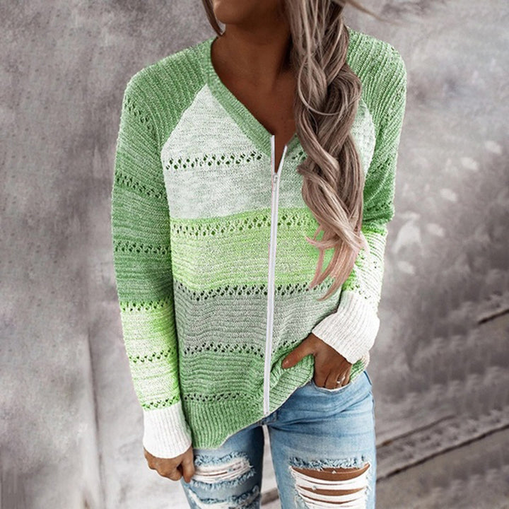 Kvinders strikket sweater med lynlås og luftige ribdetaljer Stilla