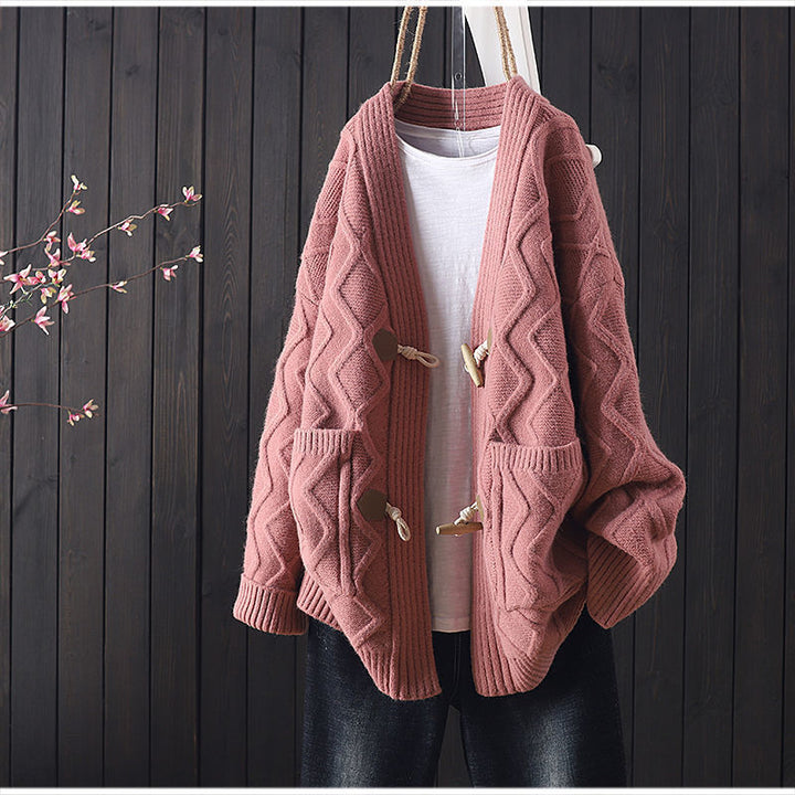 Kvinders chunky strikket cardigan med unik kabelstrikstruktur og fashionable knapdetaljer Stilla