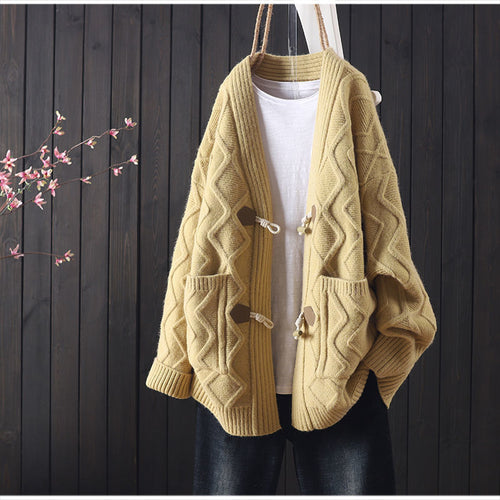 Kvinders chunky strikket cardigan med unik kabelstrikstruktur og fashionable knapdetaljer Stilla