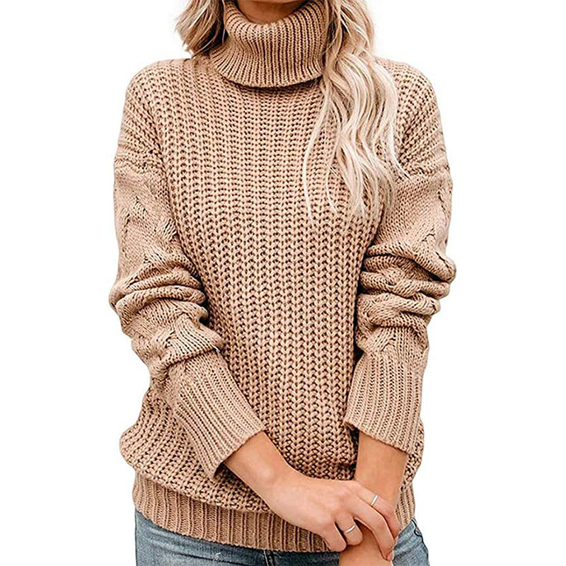 Dame strikpullover med høj krave og struktureret design Stilla