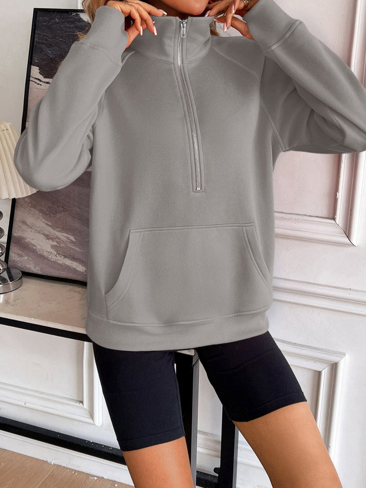 Stilla | Sved Demi Zip Med Raglanærmer