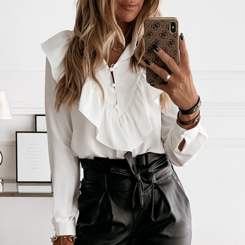 Dame ruffle top med polka prikker og elegant detalje Stilla