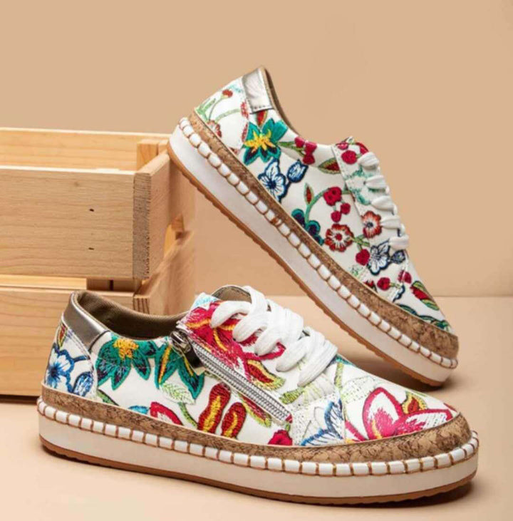 Dame sneakers med moderne blomsterbroderi og komfortabel lynlås Stilla