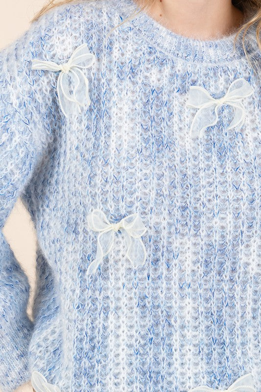 Stilla | Pullover af groft strik med broderet knude