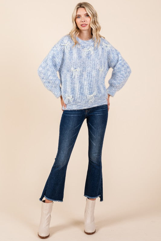 Stilla | Pullover af groft strik med broderet knude