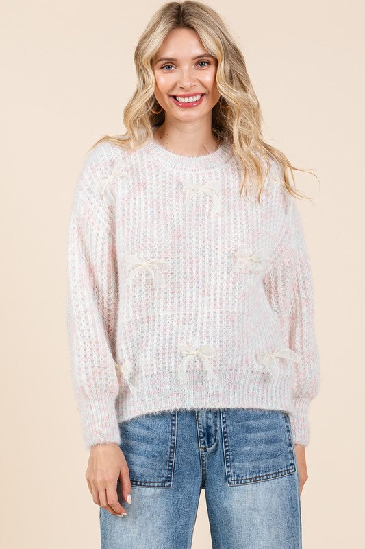 Stilla | Pullover af groft strik med broderet knude