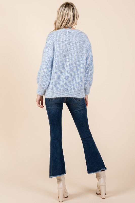 Stilla | Pullover af groft strik med broderet knude