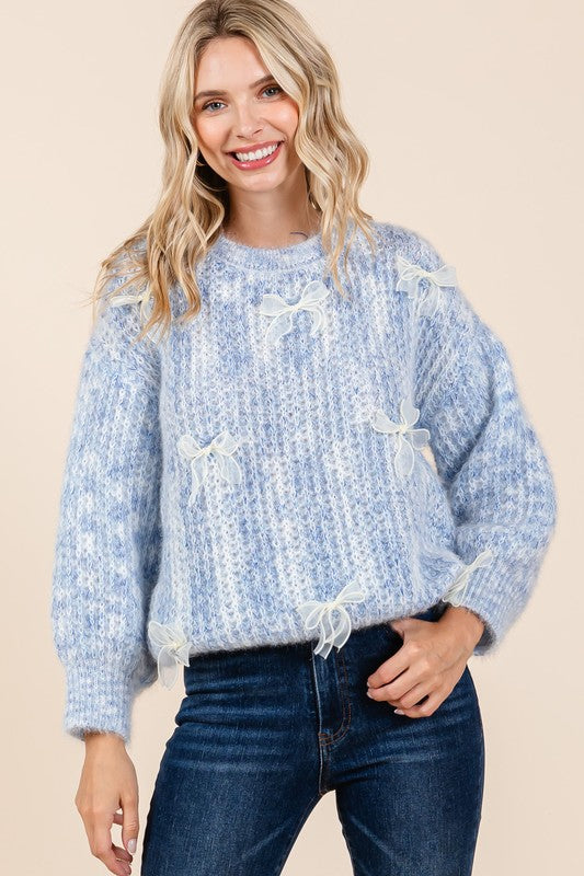 Stilla | Pullover af groft strik med broderet knude