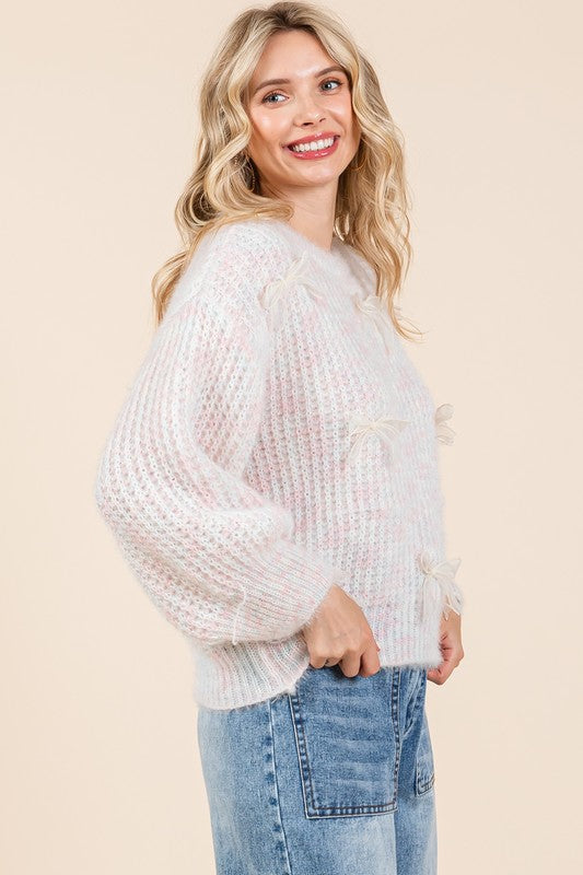 Stilla | Pullover af groft strik med broderet knude