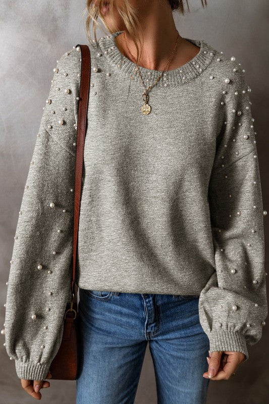 Stilla | Pullover med perler, overdrejede skuldre og rund halsudskæring