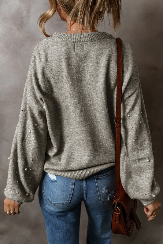 Stilla | Pullover med perler, overdrejede skuldre og rund halsudskæring