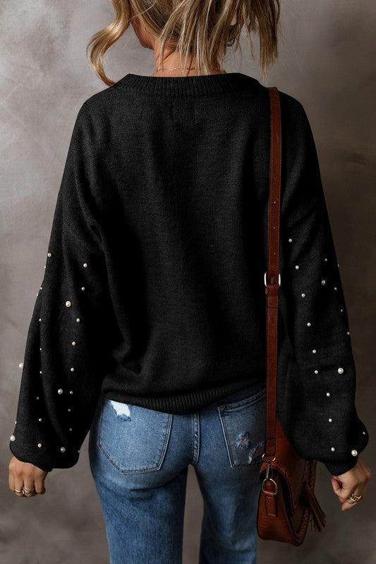 Stilla | Pullover med perler, overdrejede skuldre og rund halsudskæring
