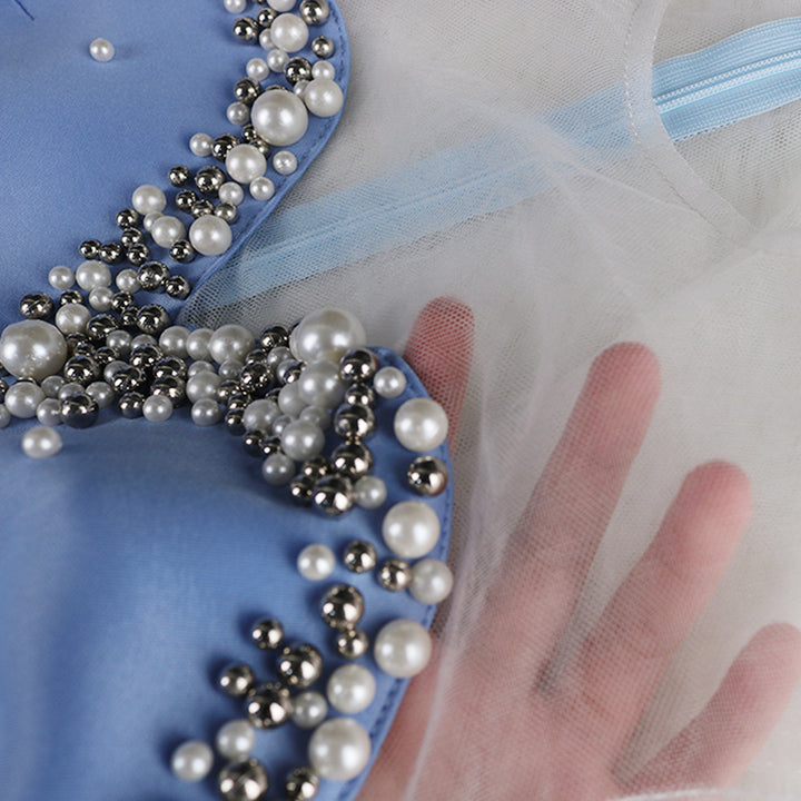 Dame glamourøst cocktailkjole med transparente puffærmer og flæsekanter Skovae