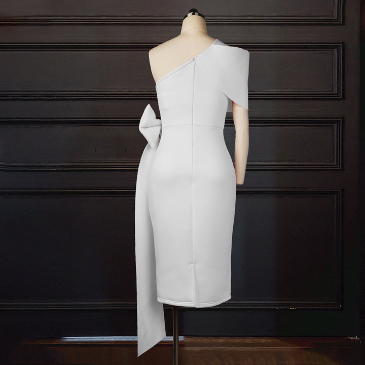 Dame elegant wrap dress med asymmetrisk top og voluminøs sløjfe accent Skovae