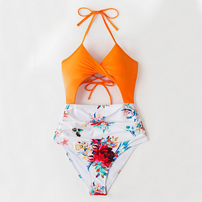 Dame enhed badesuit med spændende twist-design og højt skåret talje Stilla