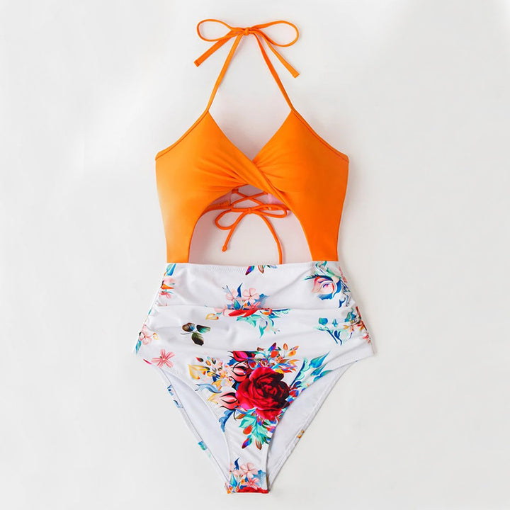 Dame enhed badesuit med spændende twist-design og højt skåret talje Stilla