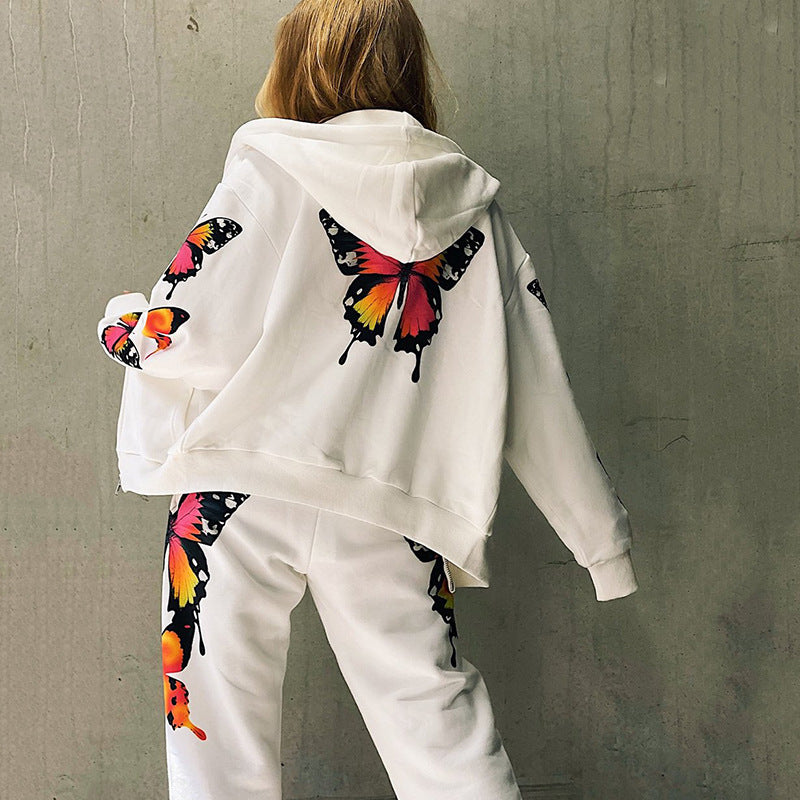 Dame Sporty Sweatshirt med farverig sommerfugletryk og behagelig pasform Stilla