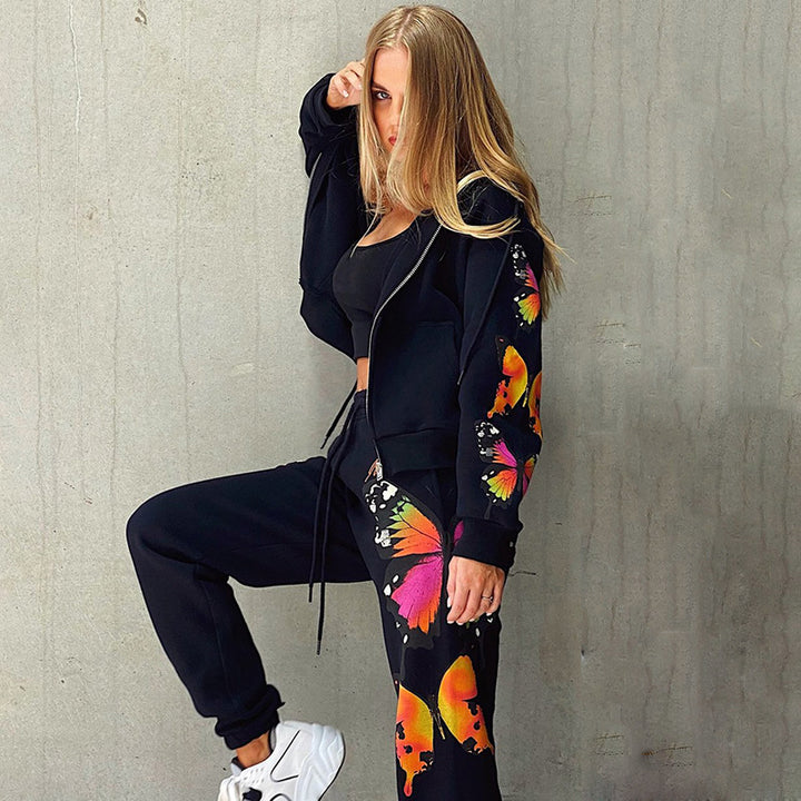 Dame Sporty Sweatshirt med farverig sommerfugletryk og behagelig pasform Stilla
