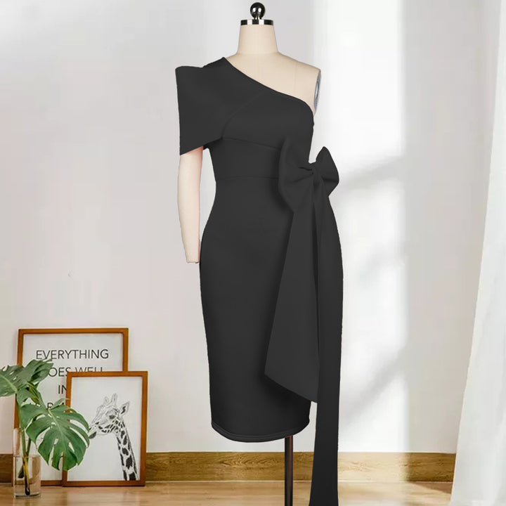 Dame elegant wrap dress med asymmetrisk top og voluminøs sløjfe accent Skovae