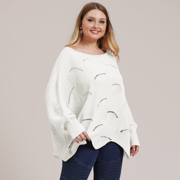 Dame luftig grovstrikket sweater med moderne hulmønster Stilla