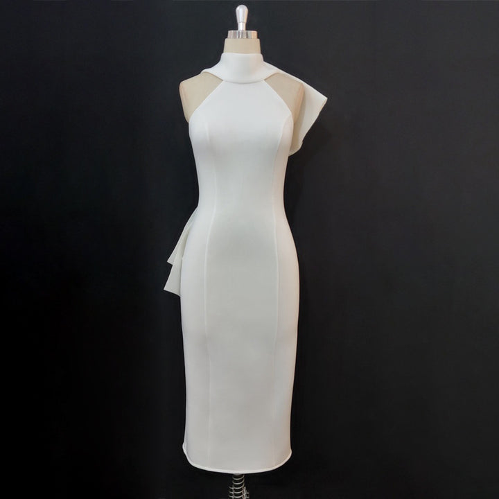 Dame Elegant skjortekjole med asymmetrisk design og svævende detalje Skovae