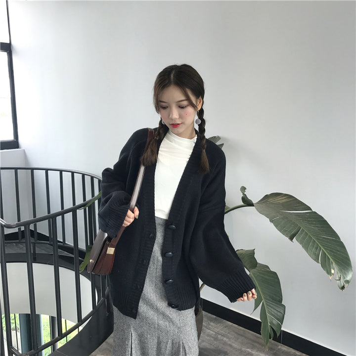 Kvinders store strikkede cardigan med afslappet design og knaplukning Stilla