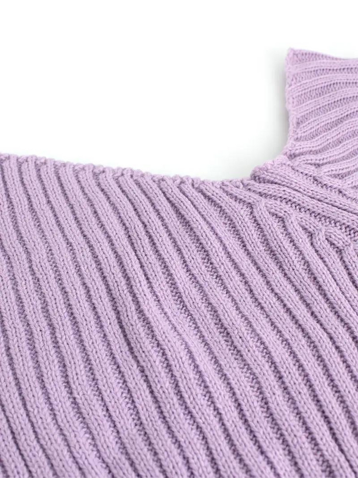 Stilla | Pullover i ribstrik med asymmetrisk udskæring