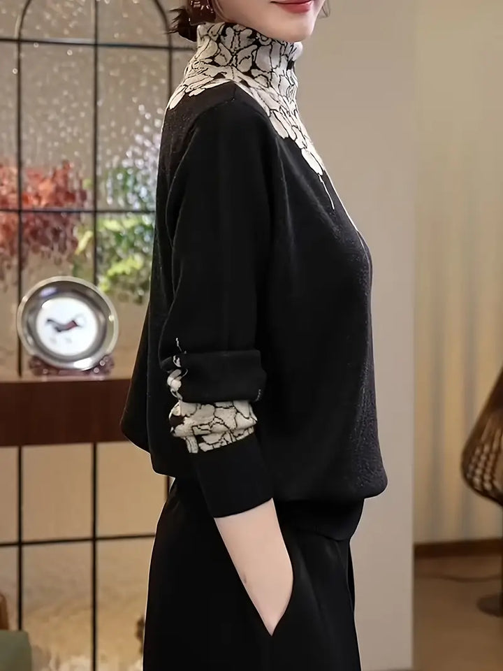 Stilla | Elegant strikpullover med rullekrave og blomstertryk